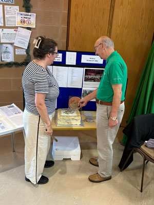Cutting the cake at the 60th Celebration